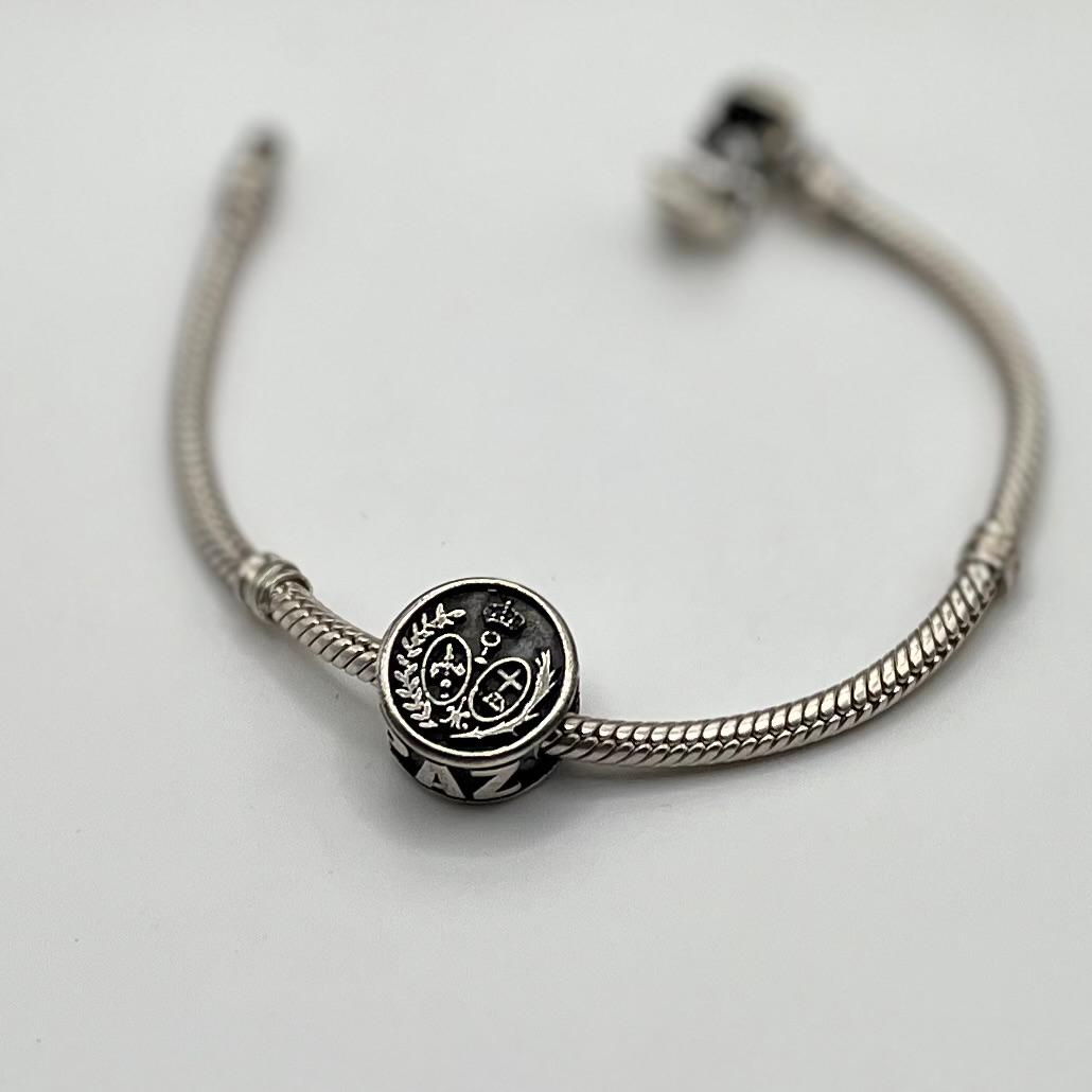 Charm escudo de la Hermandad de la Paz en plata