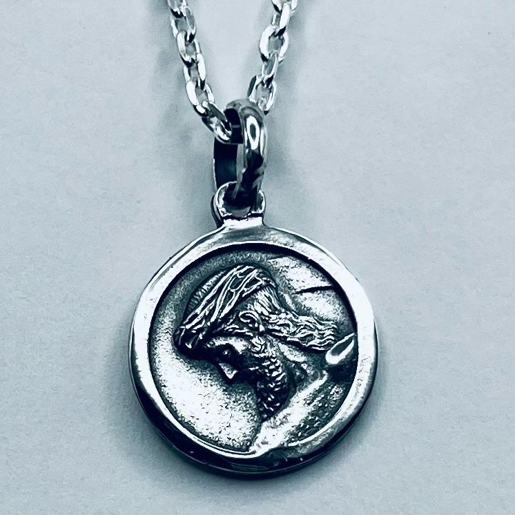 MEDALLA ESCAPULARIO CRISTO Y VIRGEN DE LA HDAD. DEL CALVARIO DE SEVILLA EN PLATA DE LEY